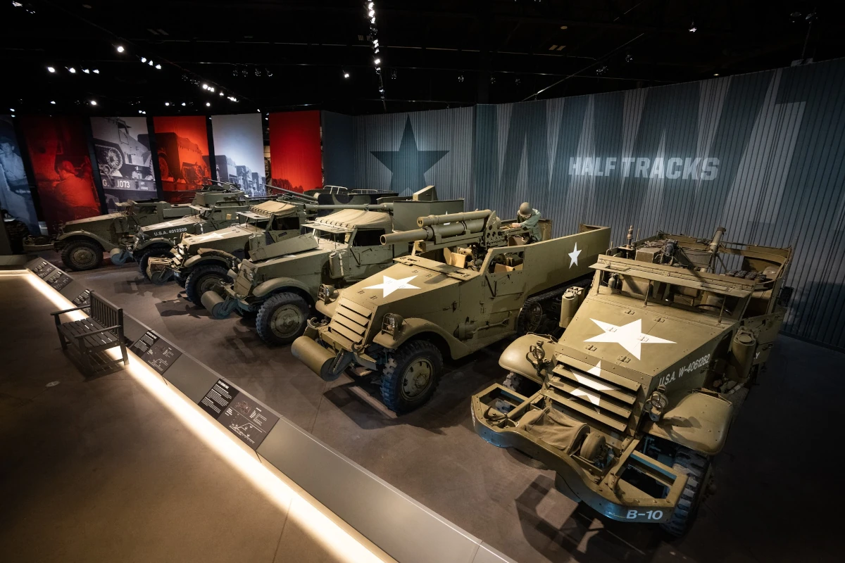 World War II half-track vehicle on display inside the National Museum of Military Vehicles.