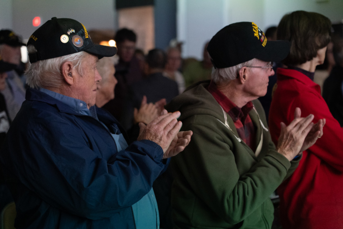 Veterans applaud following a screening of the Wyoming PBS documentary “Home From the Vietnam War,” directed by Mat Hames, during a Vietnam Veterans Day event on March 28, 2026, at the National Museum of Military Vehicles in Dubois, Wyo. The film tells the story of U.S. Army Lt. Lee Alley, Wyoming’s most decorated veteran, from his service in Vietnam to his work supporting fellow veterans. (Photo: WyomingPBS)